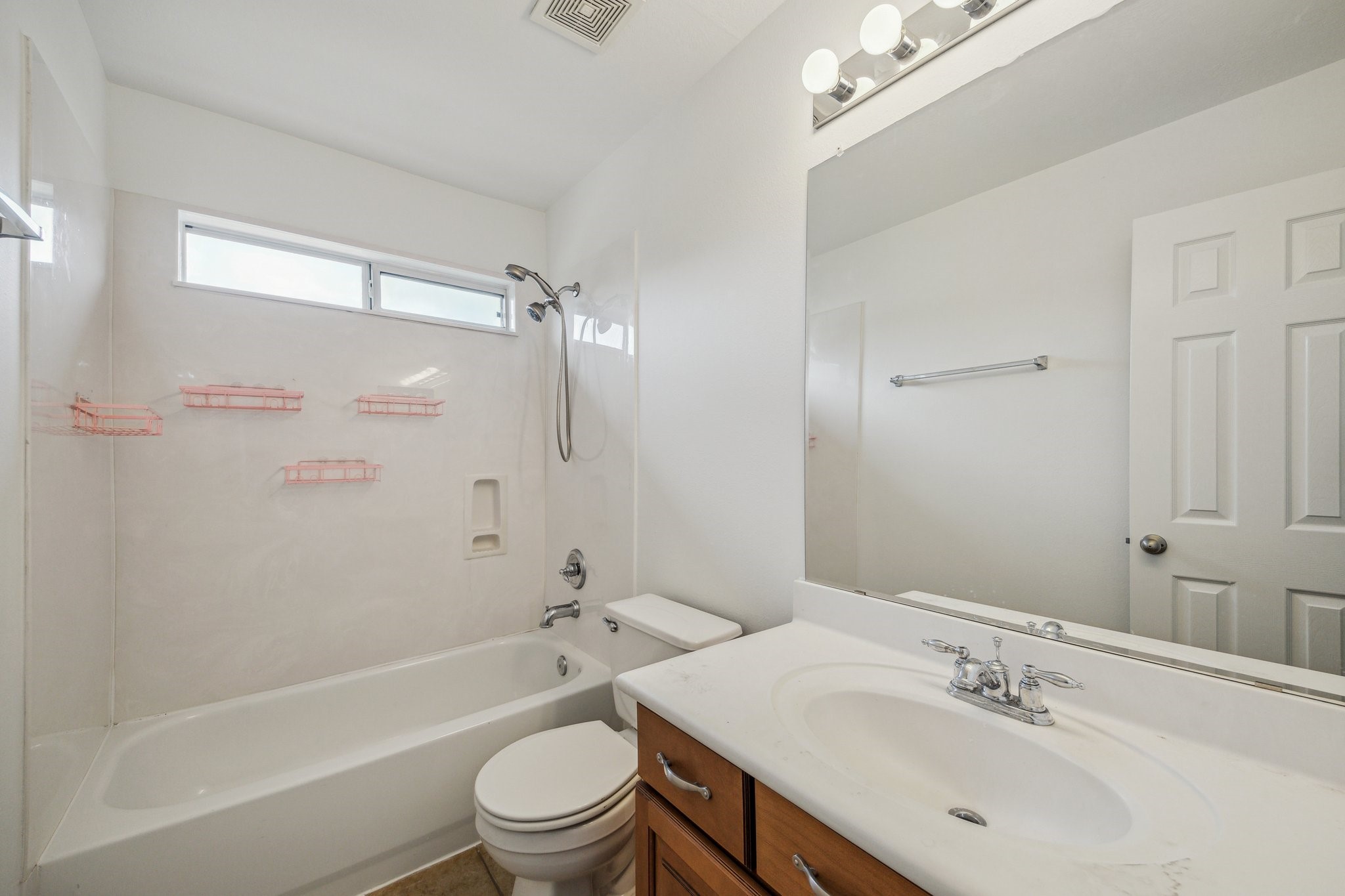 26402 Larkspur Ridge Drive Katy, TX 77494 - Photo 27 of 34 a bathroom with a sink a toilet and shower