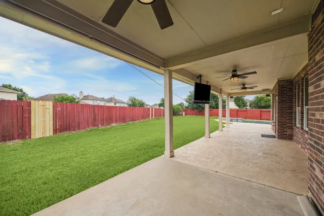 a view of a porch with a backyard