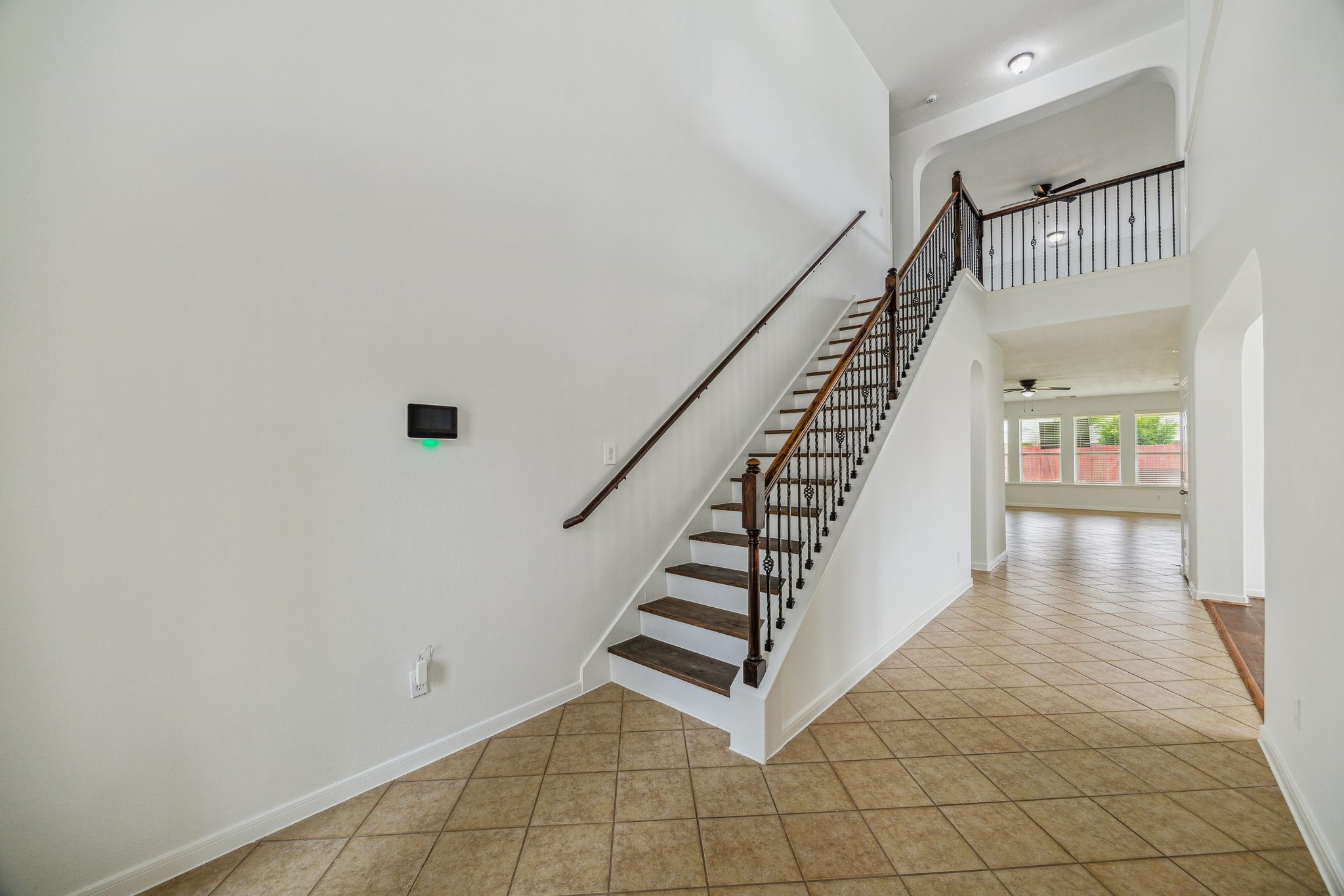 26402 Larkspur Ridge Drive Katy, TX 77494 - Photo 5 of 34 a view of entryway and hall with wooden floor