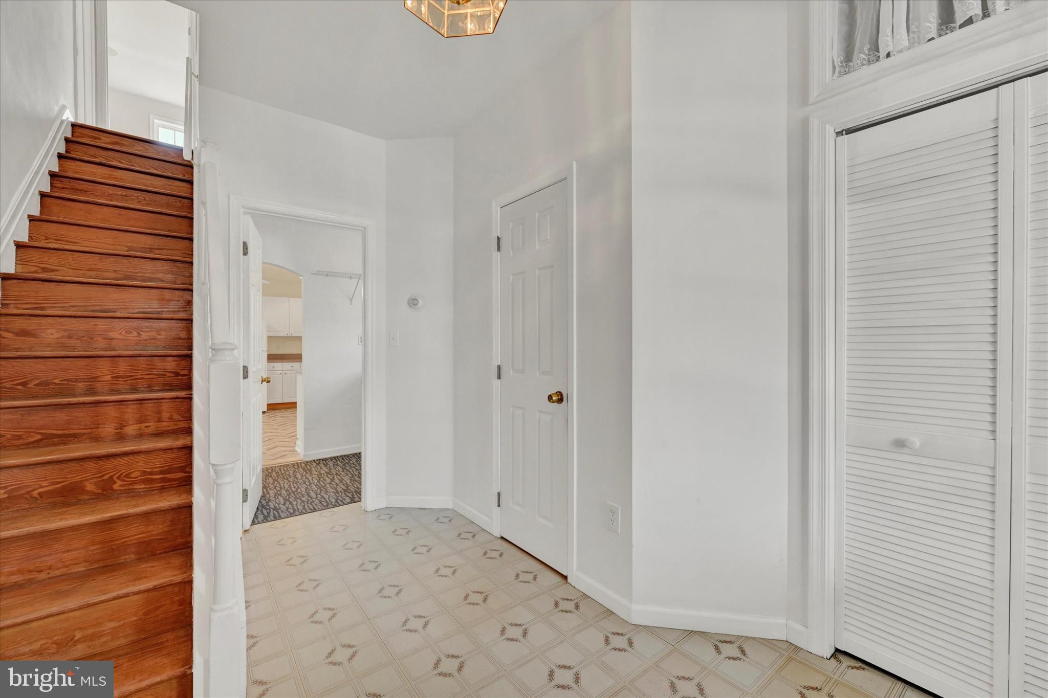 1203 Fairfield Avenue Baltimore, MD 21209 - Photo 15 of 32 a view of hallway with wooden floor