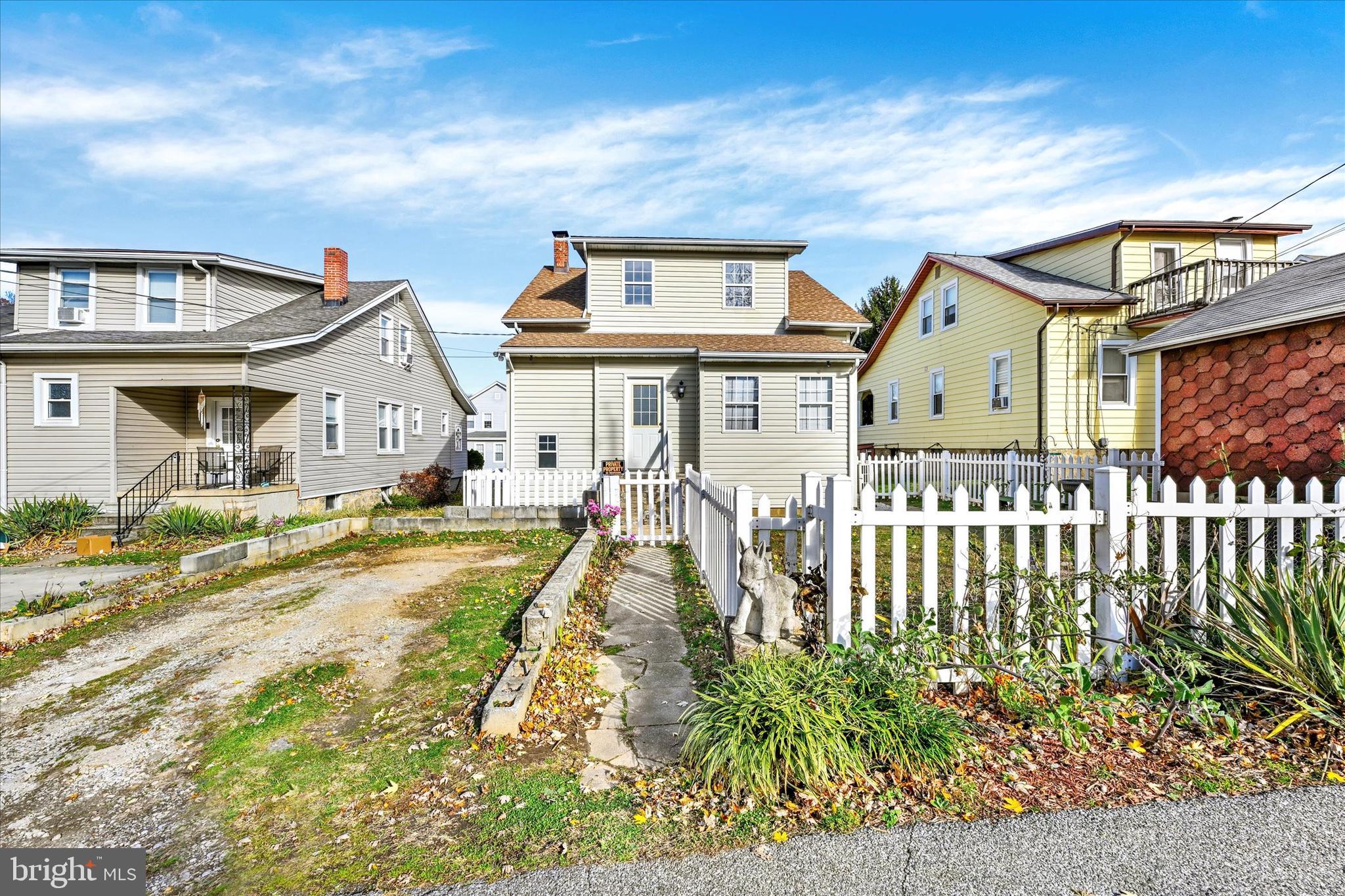 1203 Fairfield Avenue Baltimore, MD 21209 - Photo 25 of 32 a front view of a house with a porch