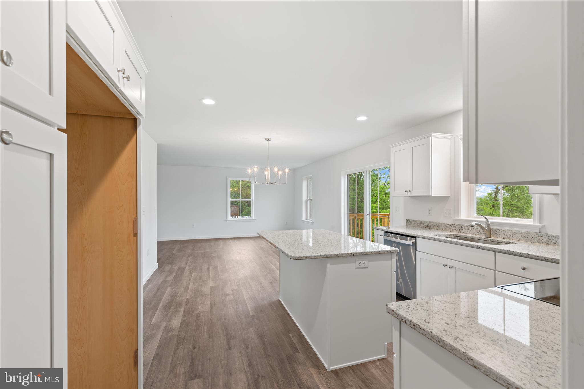 10 Stream Drive Carlisle, PA 17013 - Photo 11 of 48 a view of a kitchen with a sink and wooden floor