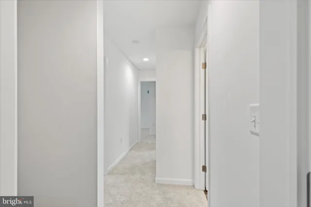a view of a hallway with closet