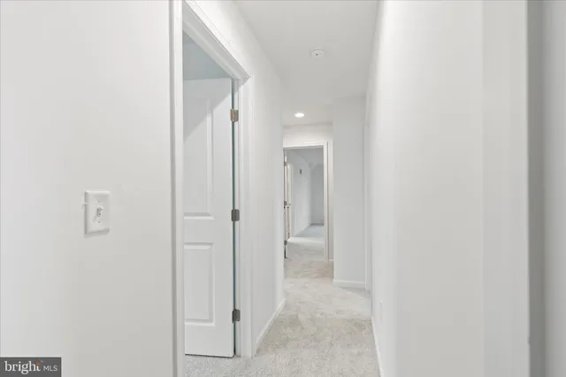 a view of a bathroom with a glass shower door
