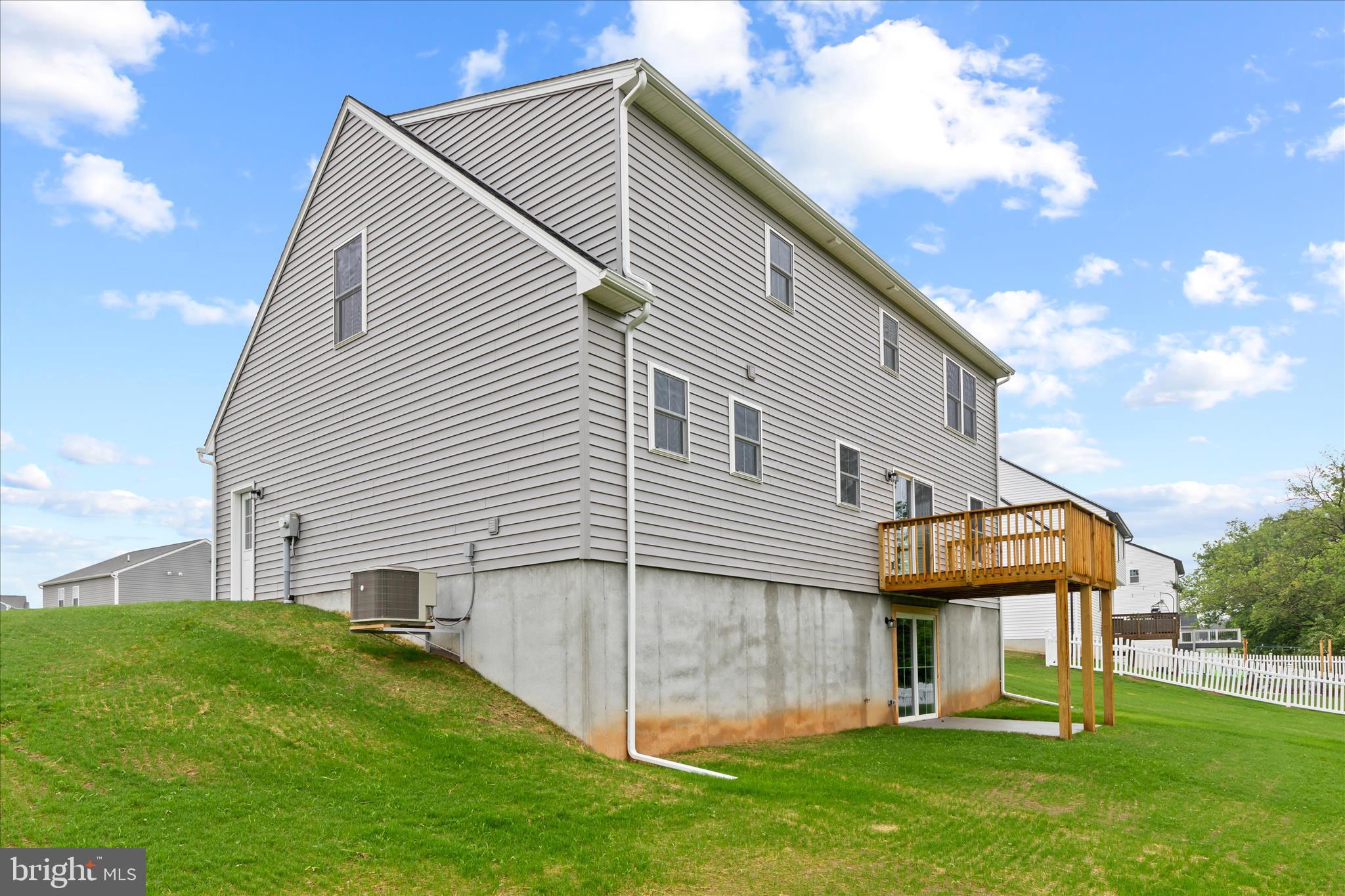10 Stream Drive Carlisle, PA 17013 - Photo 32 of 48 a front view of a house with a garden