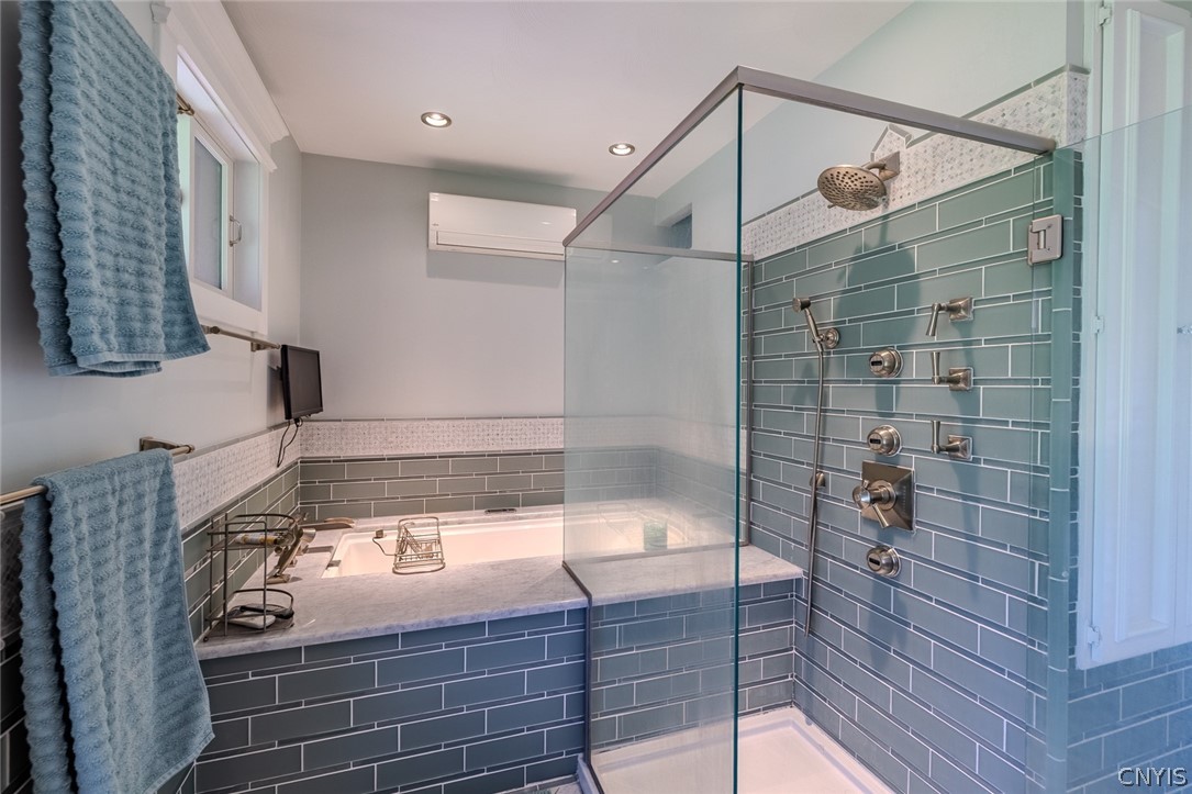 6307 Muskrat Bay Road Cicero, NY 13029 - Photo 16 of 47 Owner's ensuite with a whirlpool tub.