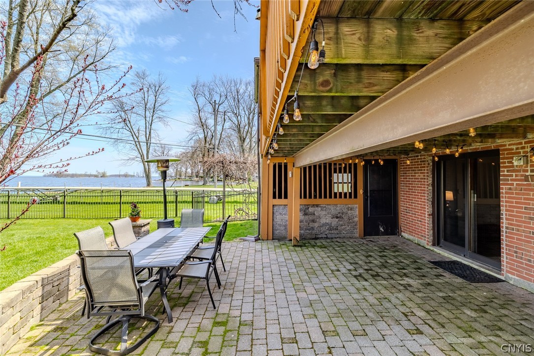 6307 Muskrat Bay Road Cicero, NY 13029 - Photo 22 of 47 Rear patio with an additional rear garage for util