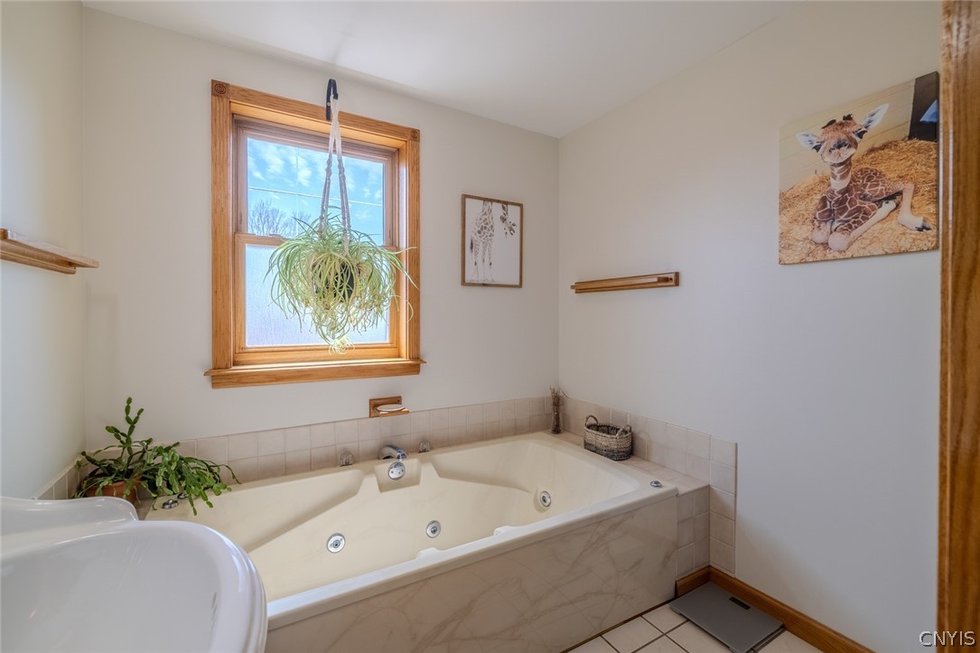 6307 Muskrat Bay Road Cicero, NY 13029 - Photo 32 of 47 Second floor full bath with whirlpool tub.
