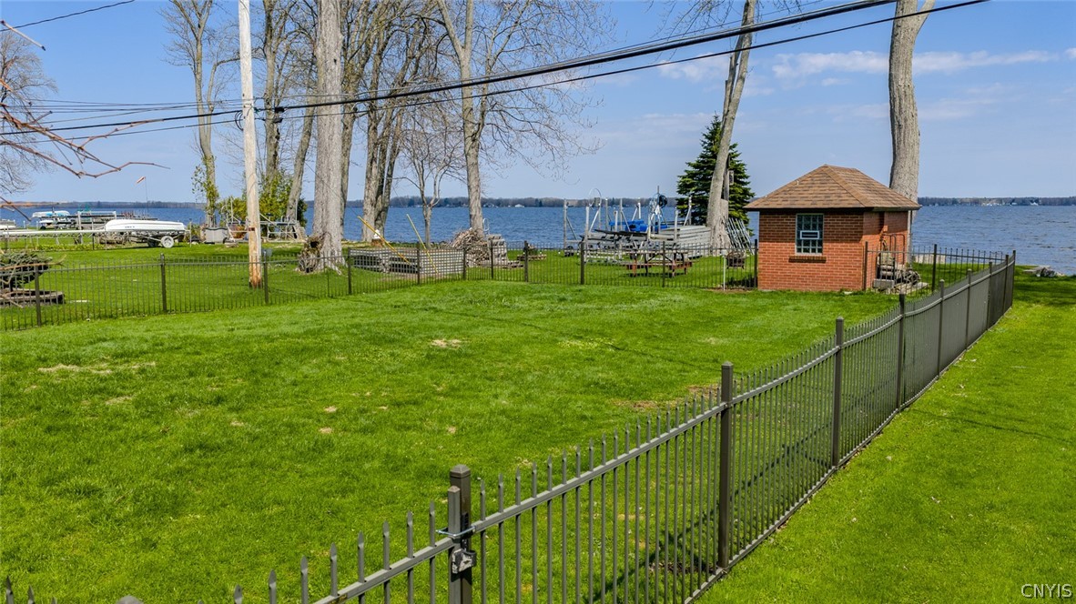 6307 Muskrat Bay Road Cicero, NY 13029 - Photo 40 of 47 Fully fenced rear yard with additional storage in