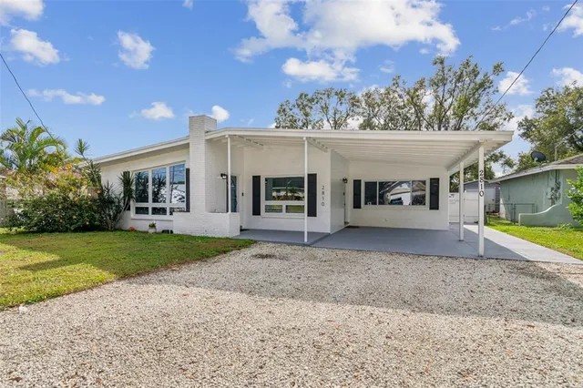 front view of a house with a patio