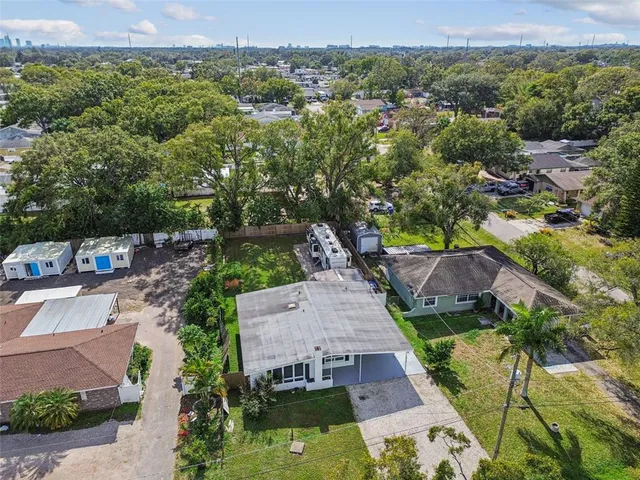 an aerial view of a house with a garden
