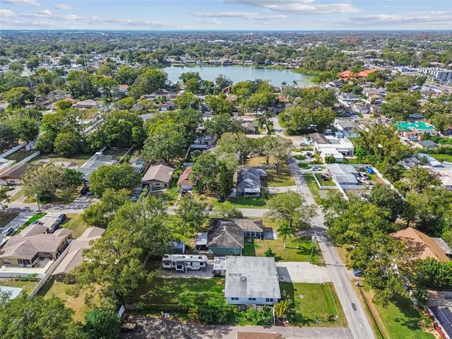 an aerial view of a house with a garden