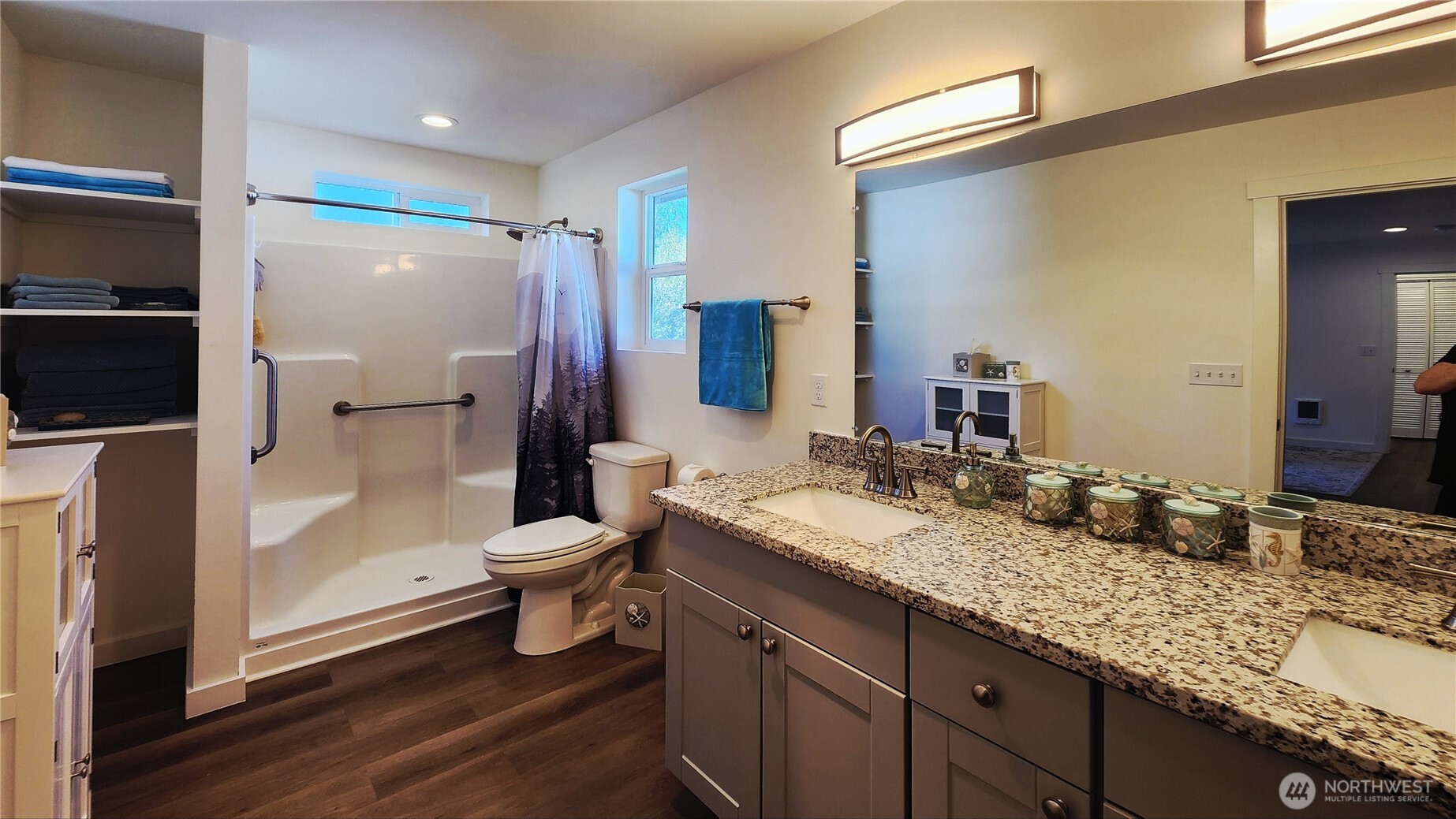 371 Centaurus Avenue Southwest Ocean Shores, WA 98569 - Photo 20 of 40 a bathroom with a granite countertop sink toilet and shower