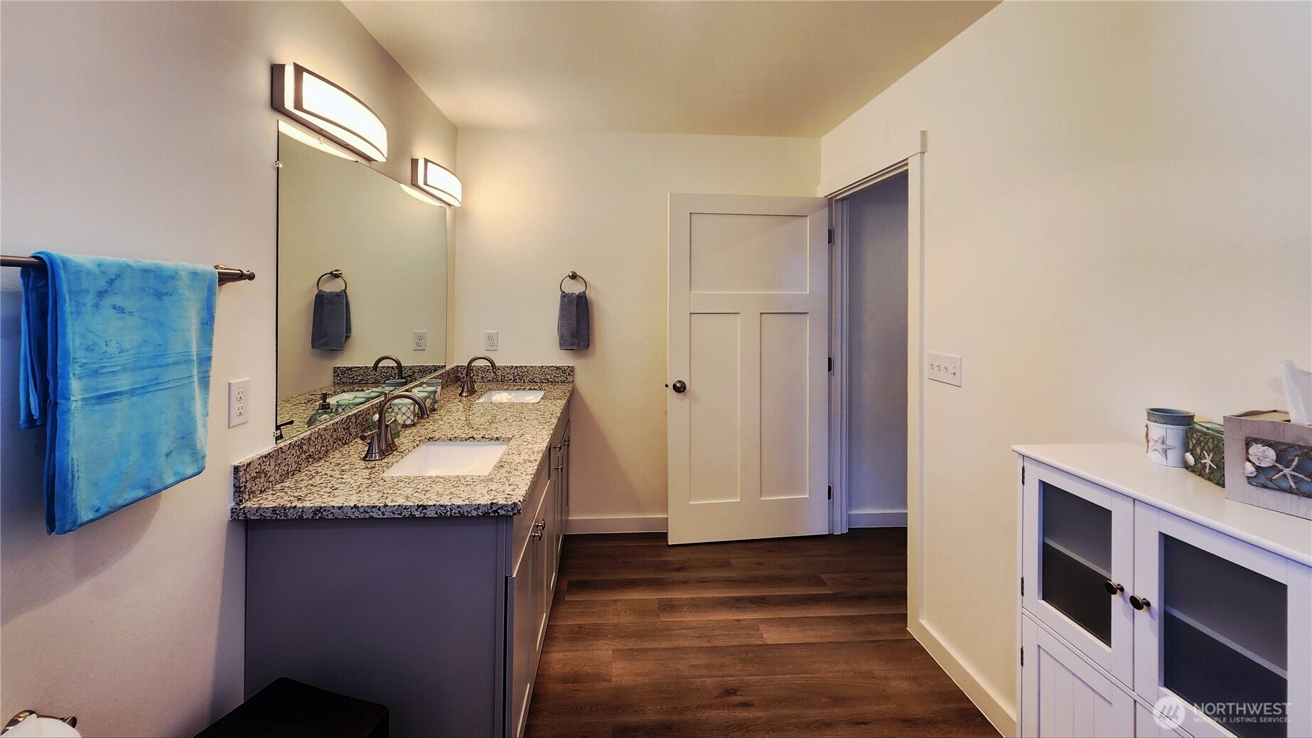 371 Centaurus Avenue Southwest Ocean Shores, WA 98569 - Photo 22 of 40 a bathroom with a sink and a mirror