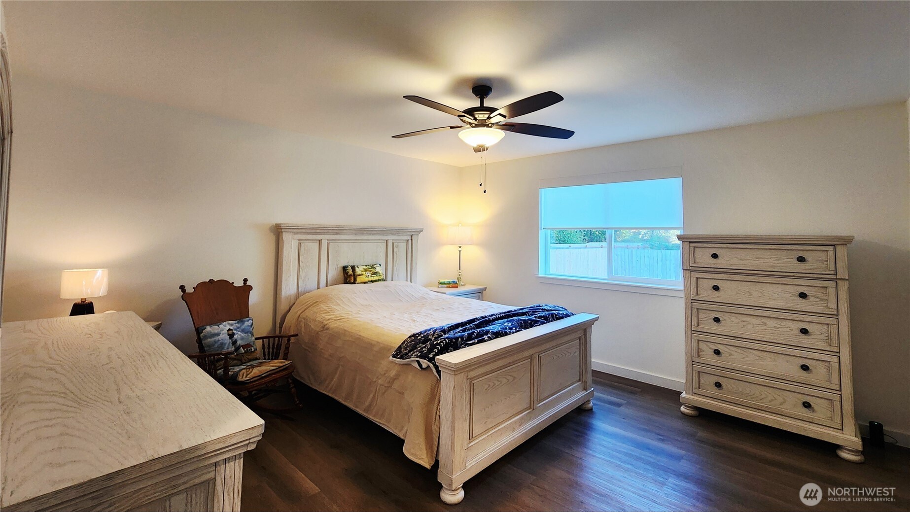 371 Centaurus Avenue Southwest Ocean Shores, WA 98569 - Photo 26 of 40 a bedroom with a bed and a ceiling fan