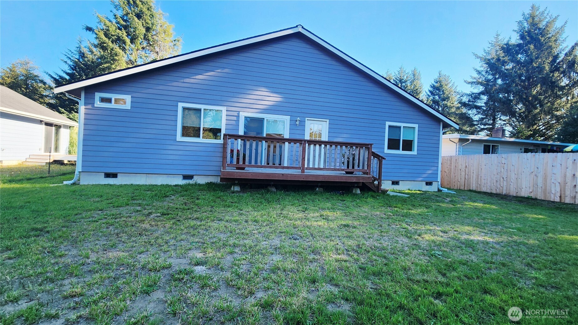 371 Centaurus Avenue Southwest Ocean Shores, WA 98569 - Photo 37 of 40 a view of a house with a backyard