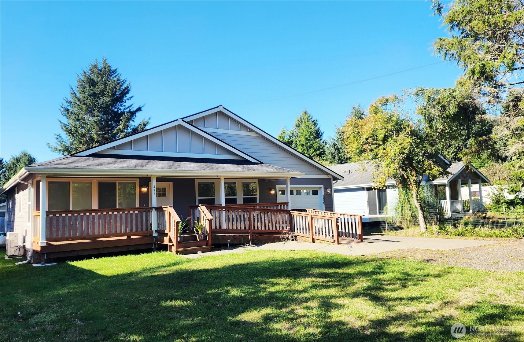 371 Centaurus Avenue Southwest Ocean Shores, WA 98569 - Photo 39 of 40 a view of a house with a yard and a garden