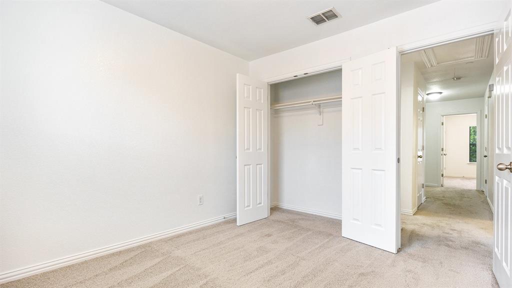 3206 Bedford Road Bedford, TX 76021 - Photo 15 of 26 an empty room with a bathroom