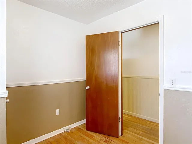 a kitchen with stainless steel appliances a stove a sink and a refrigerator