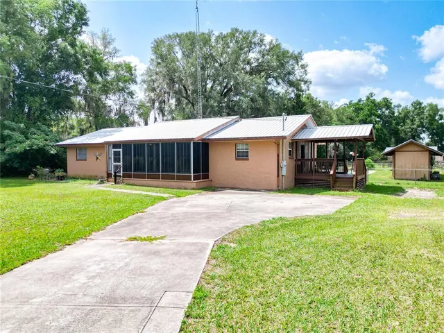 a view of a house with a swimming pool