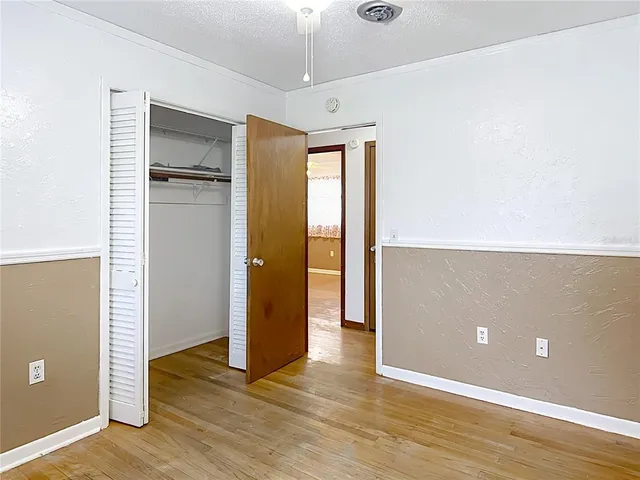 a view of house with a swimming pool