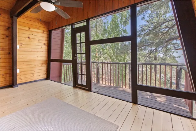 a view of hallway with a large window