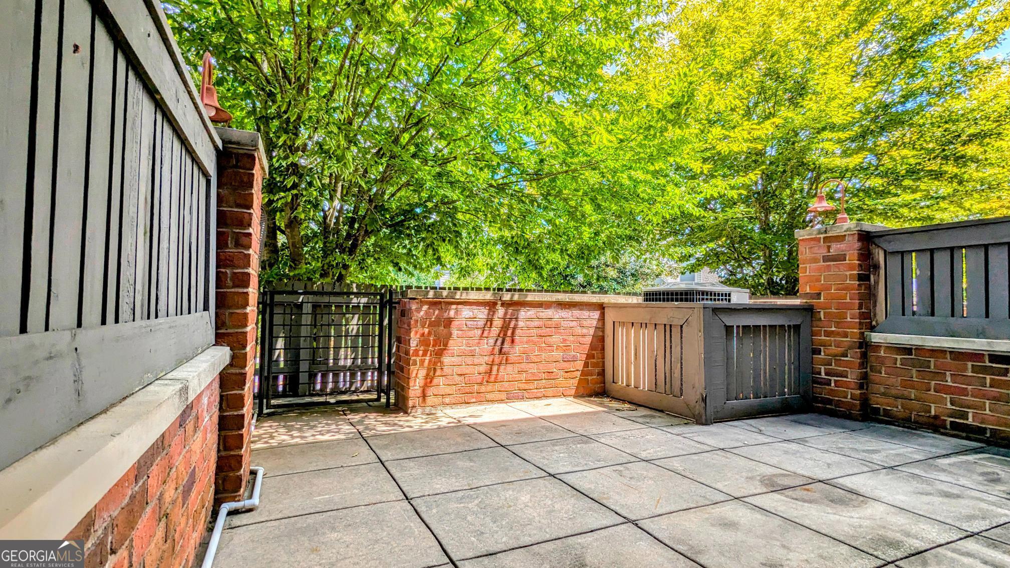 1500 Timothy Road, Unit A4 Athens, GA 30606 - Photo 14 of 35 a view of a house with backyard and sitting area