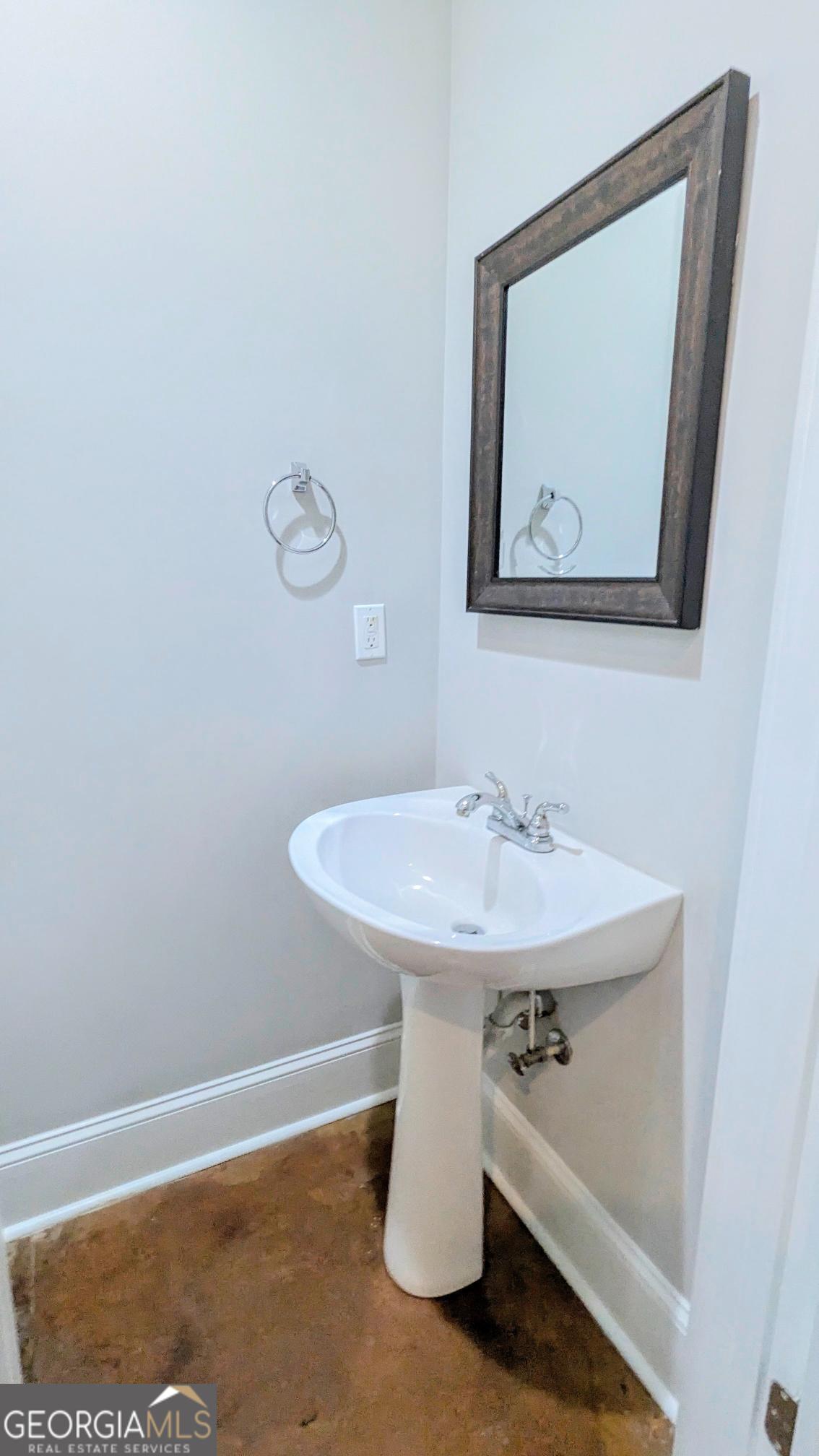 1500 Timothy Road, Unit A4 Athens, GA 30606 - Photo 16 of 35 a bathroom with a sink and mirror