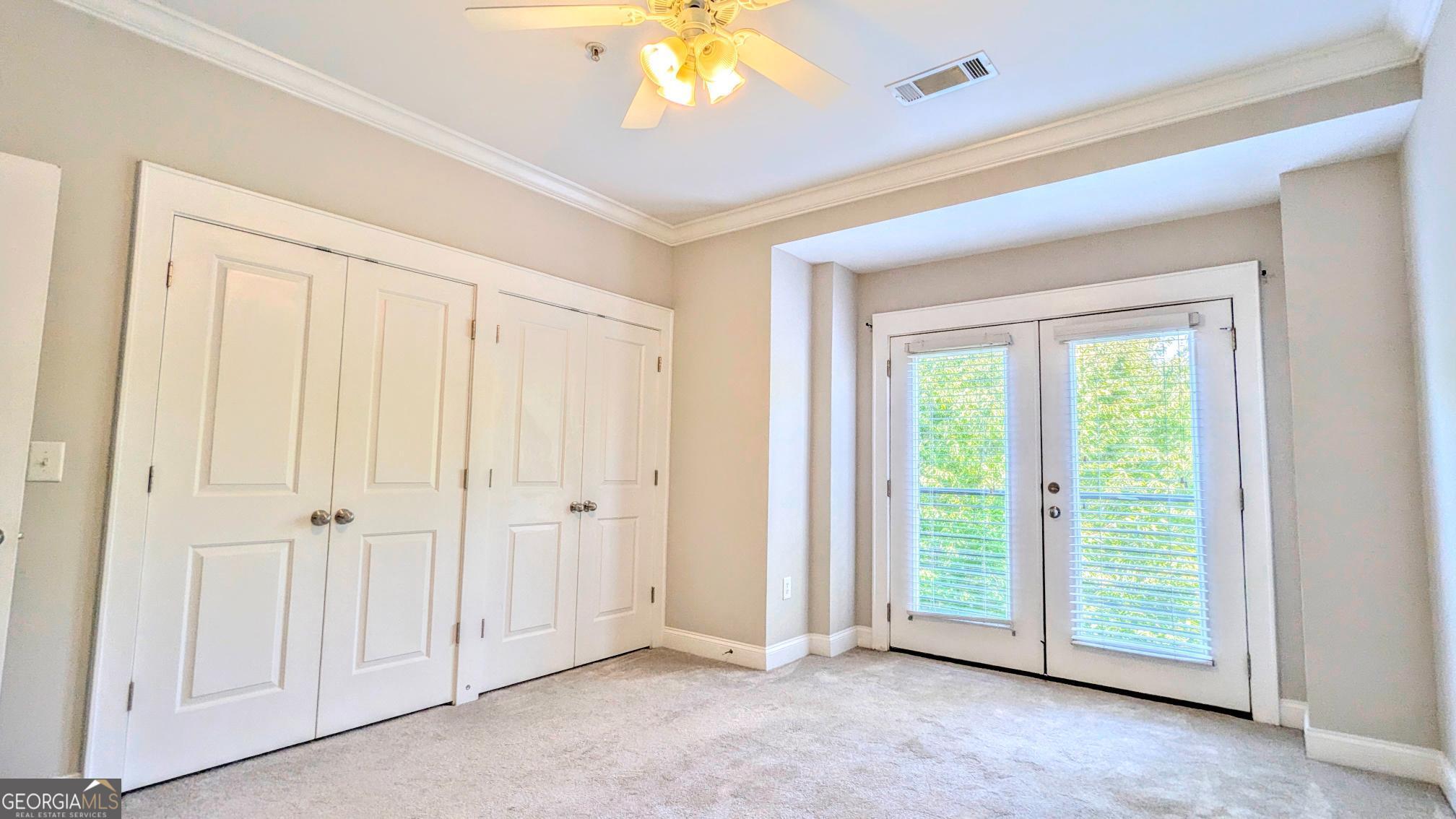 1500 Timothy Road, Unit A4 Athens, GA 30606 - Photo 19 of 35 an empty room with closet area