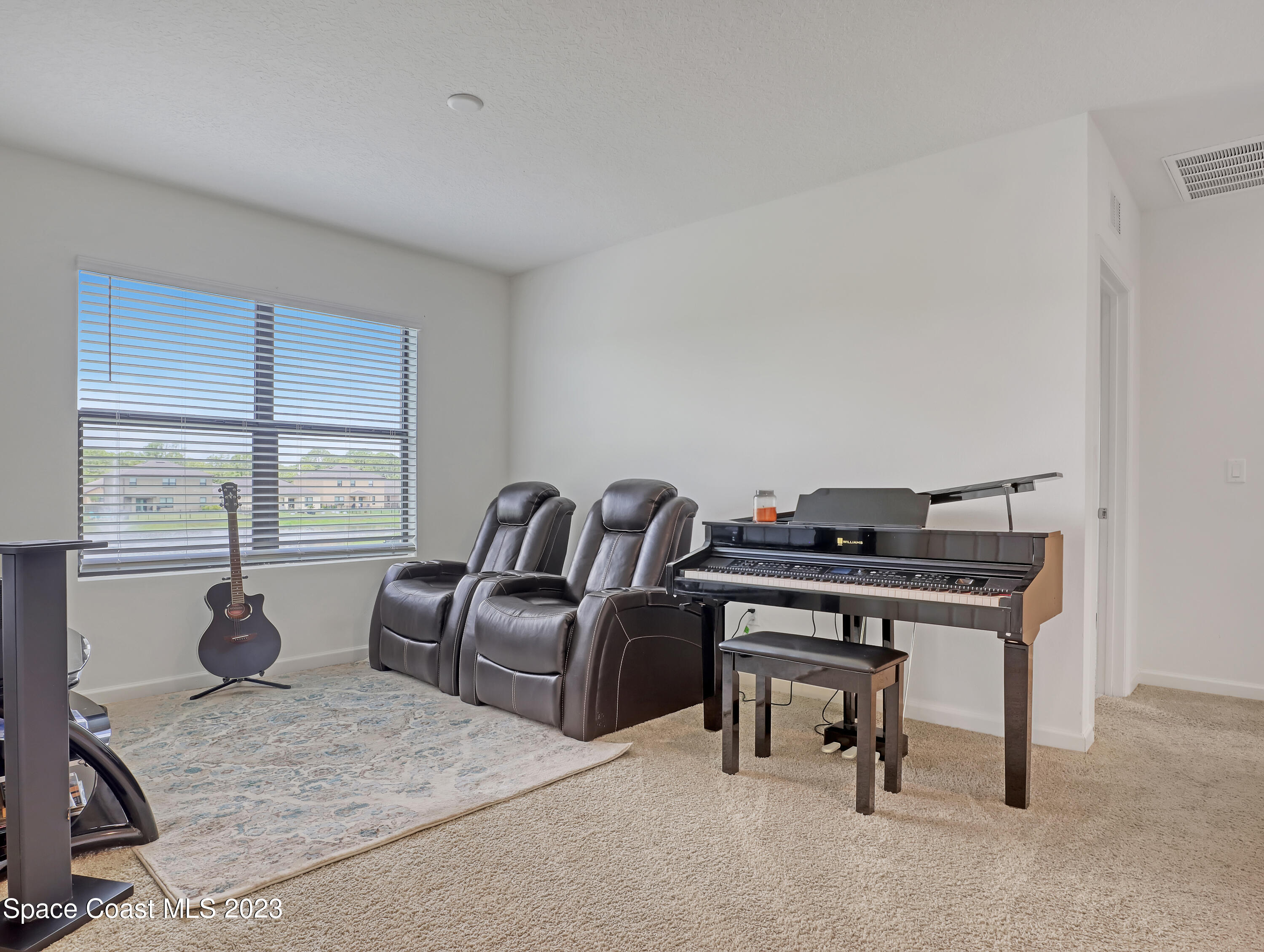 1652 Saxton Road Cocoa, FL 32926 - Photo 24 of 53 a living room with furniture