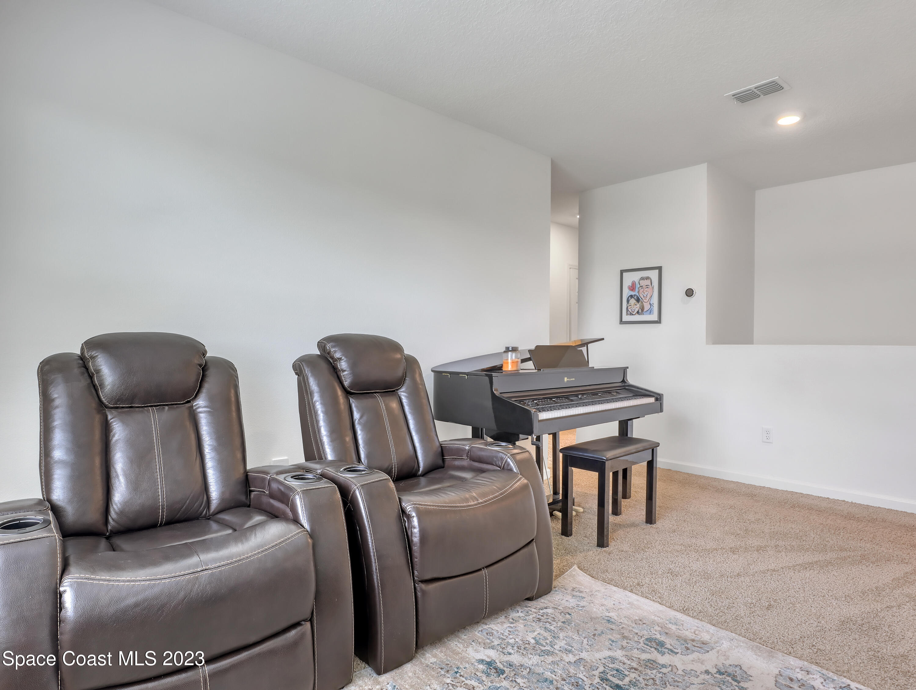 1652 Saxton Road Cocoa, FL 32926 - Photo 25 of 53 a living room with furniture