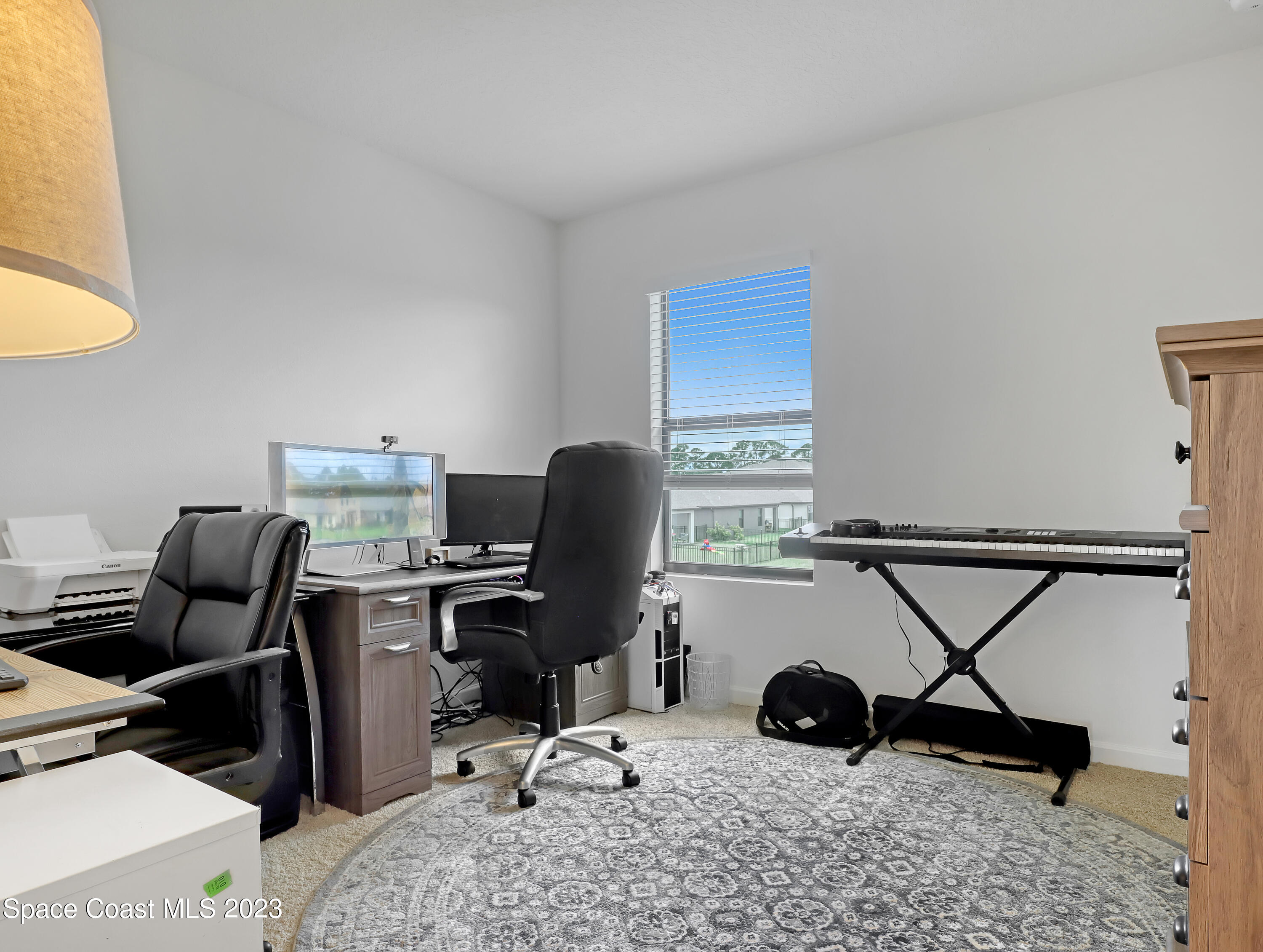 1652 Saxton Road Cocoa, FL 32926 - Photo 36 of 53 a view of workspace with a window