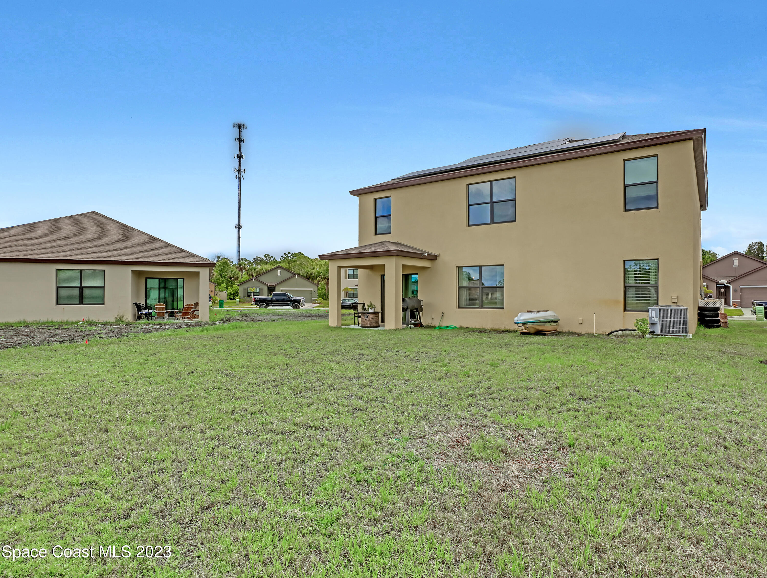 1652 Saxton Road Cocoa, FL 32926 - Photo 44 of 53 a front view of a house with a garden