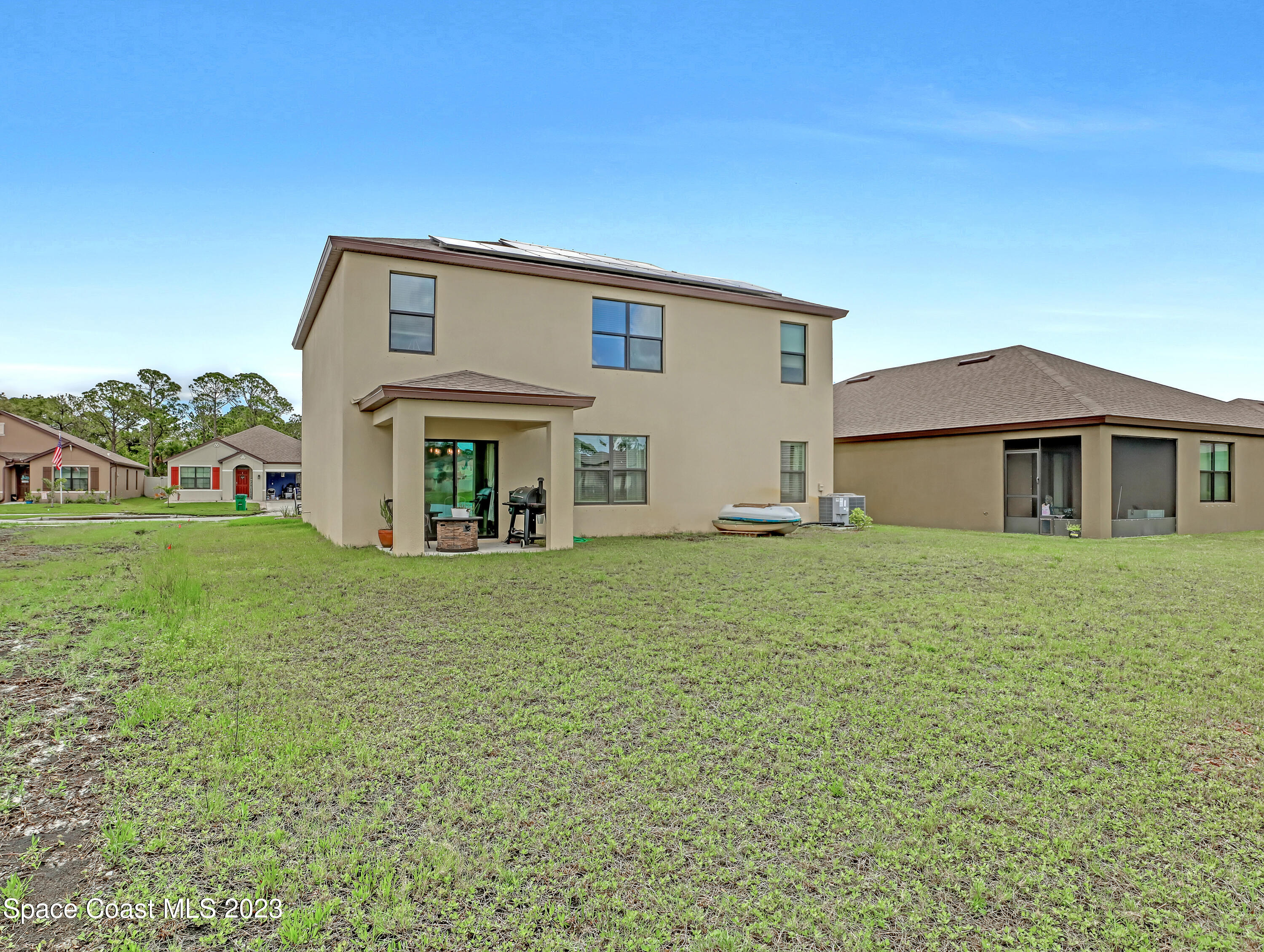 1652 Saxton Road Cocoa, FL 32926 - Photo 46 of 53 a front view of a house with a garden