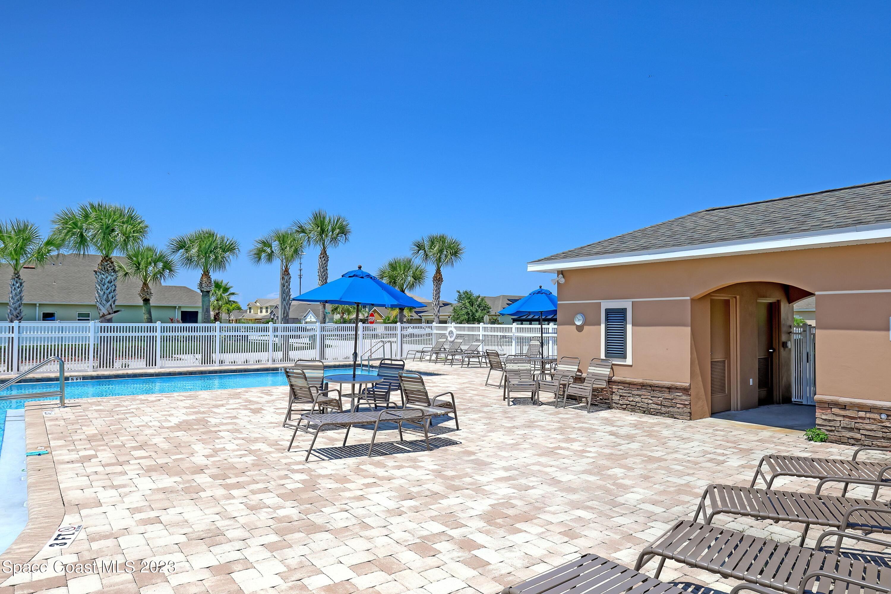 1652 Saxton Road Cocoa, FL 32926 - Photo 50 of 53 a view of a house with outdoor space and sitting area