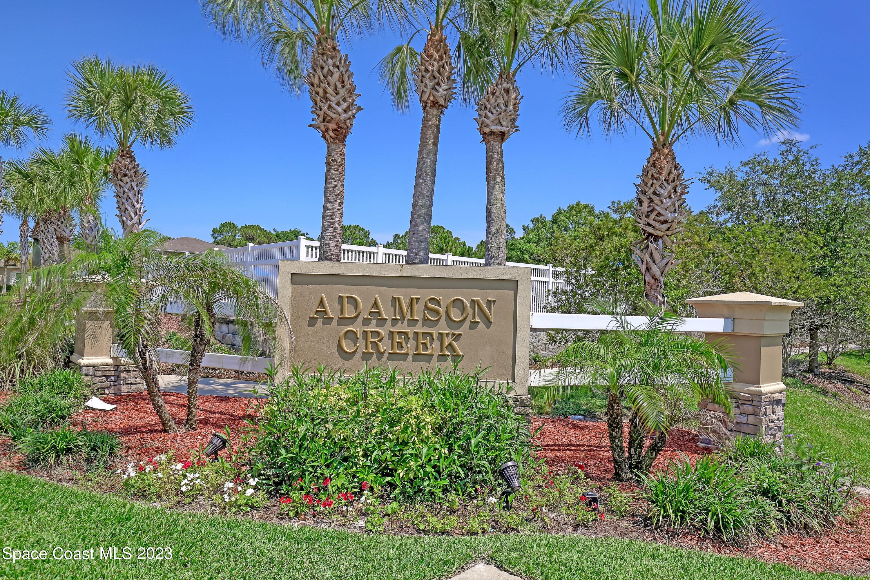 1652 Saxton Road Cocoa, FL 32926 - Photo 53 of 53 a view of a park with potted plants and palm trees