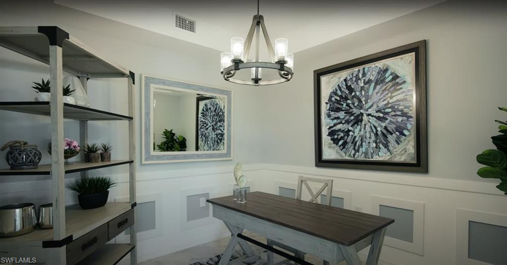 5466 Double Eagle Circle, Unit 3423 Ave Maria, FL 34142 - Photo 9 of 24 Office space featuring an inviting chandelier