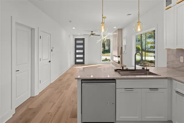a view of a porch with wooden floor and iron stairs