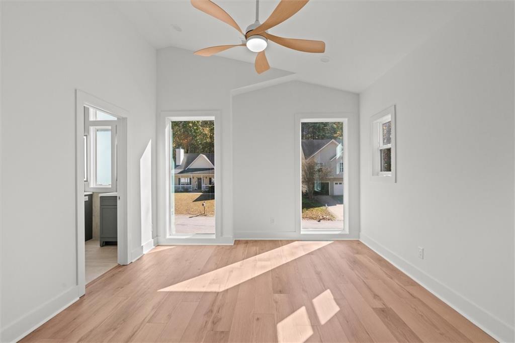752 Crystal Bay Road Villa Rica, GA 30180 - Photo 18 of 60 a bedroom with a bed and a window