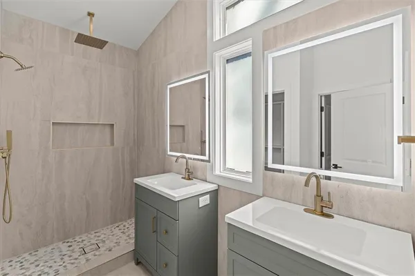 a bathroom with a sink and a mirror
