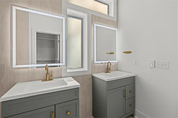 a bathroom with a sink and toilet