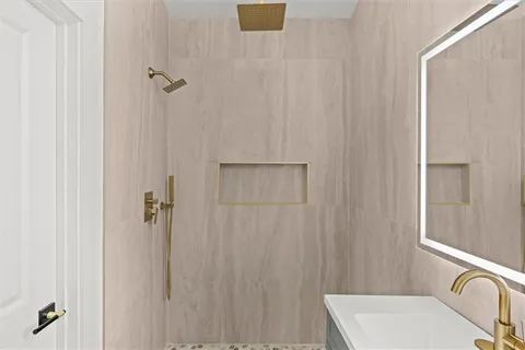 a bathroom with a sink toilet and shower