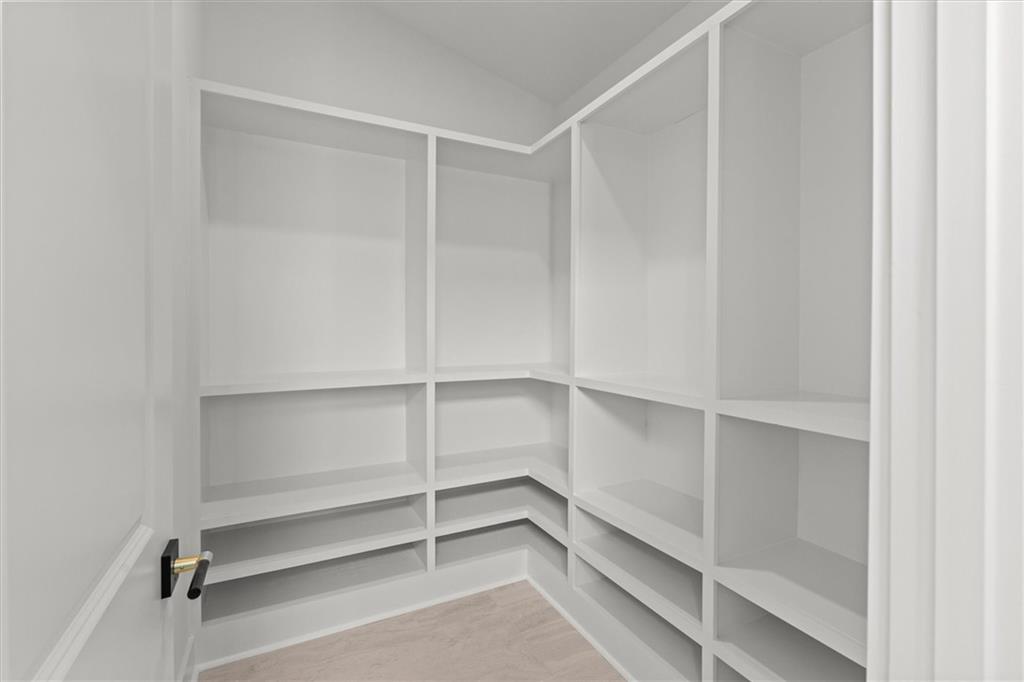 752 Crystal Bay Road Villa Rica, GA 30180 - Photo 23 of 60 a view of an empty walk in closet