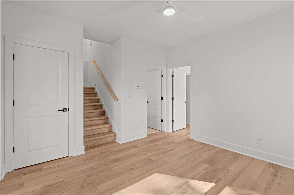 752 Crystal Bay Road Villa Rica, GA 30180 - Photo 28 of 60 a view of a hallway with wooden floor and entryway