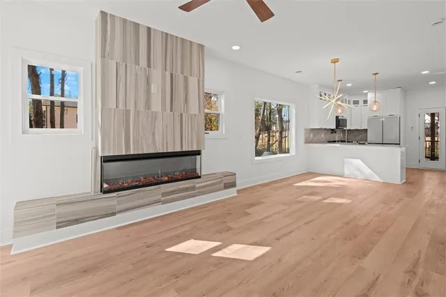 a view of a kitchen with a sink and a window