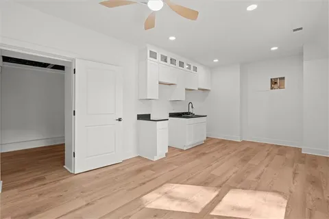 a bathroom with a sink and a shower