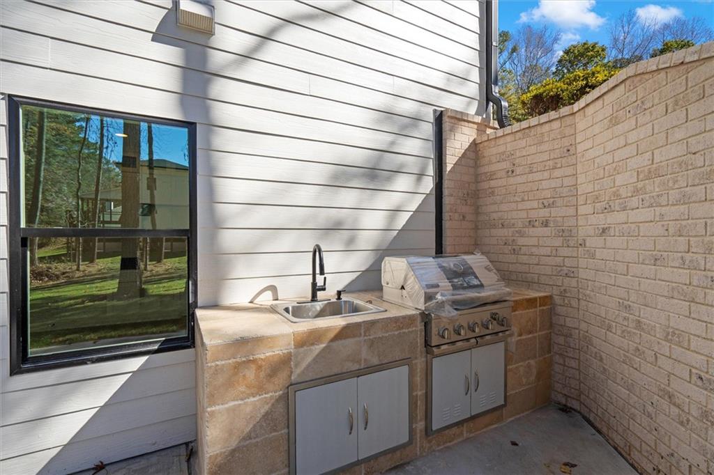 752 Crystal Bay Road Villa Rica, GA 30180 - Photo 39 of 60 a bathroom with a sink and a shower