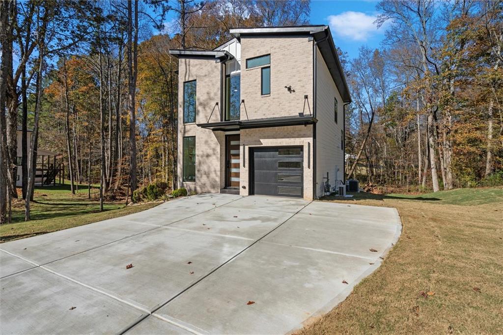 752 Crystal Bay Road Villa Rica, GA 30180 - Photo 51 of 60 front view of a house with a yard