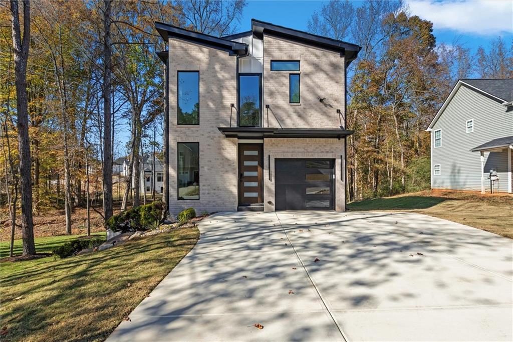 752 Crystal Bay Road Villa Rica, GA 30180 - Photo 53 of 60 a front view of a house with a yard