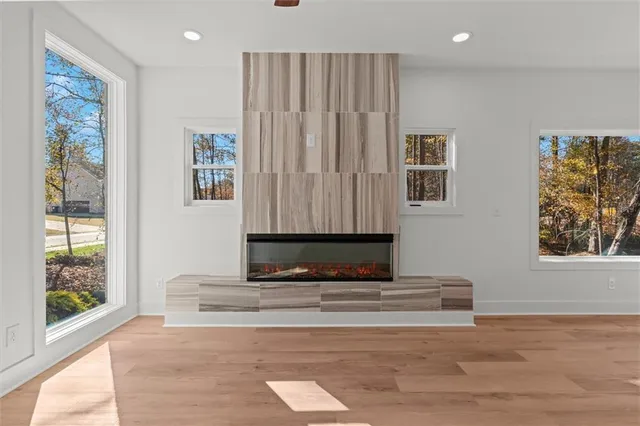 a view of room with window and hardwood floor